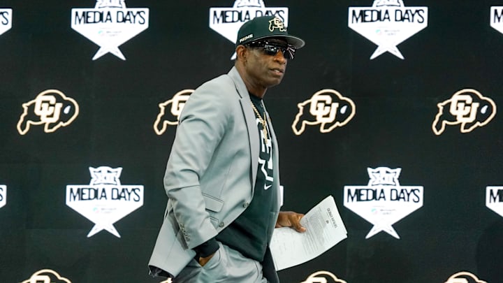 Jul 9, 2025; Frisco, TX, USA; Colorado head coach Deion Sanders walks onto the stage during 2025 Big 12 Football Media Days at The Star. Mandatory Credit: Raymond Carlin III-Imagn Images