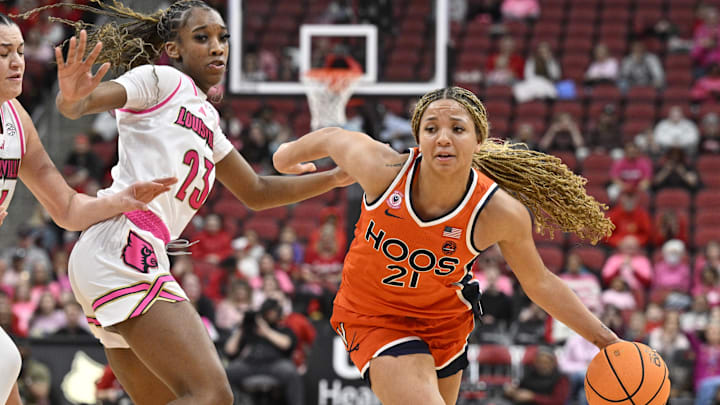 Kymora Johnson (right) and Virginia took down No. 8 Louisville on Sunday. Kymora Johnson (right) and Virginia took down No. 8 Louisville on Sunday.