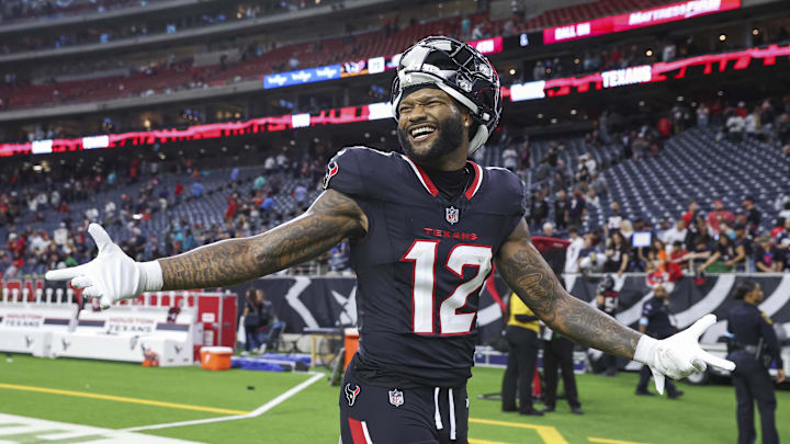 Houston Texans wide receiver Nico Collins (12) smiles after the game against the Miami Dolphins at NRG Stadium.