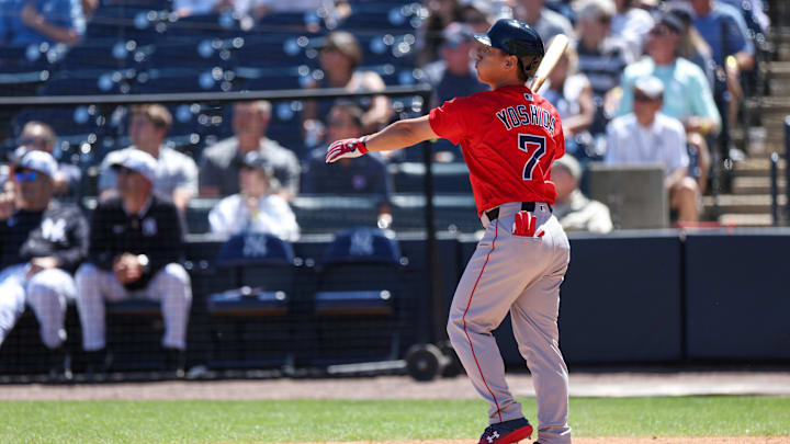 Mar 18, 2025; Tampa, Florida, USA; Boston Red Sox outfielder Masataka Yoshida (7) hits a two run home runagainst the New York Yankees in the sixth inning during spring training at George M. Steinbrenner Field. Mandatory Credit: Nathan Ray Seebeck-Imagn Images Mar 18, 2025; Tampa, Florida, USA; Boston Red Sox outfielder Masataka Yoshida (7) hits a two run home runagainst the New York Yankees in the sixth inning during spring training at George M. Steinbrenner Field. Mandatory Credit: Nathan Ray Seebeck-Imagn Images