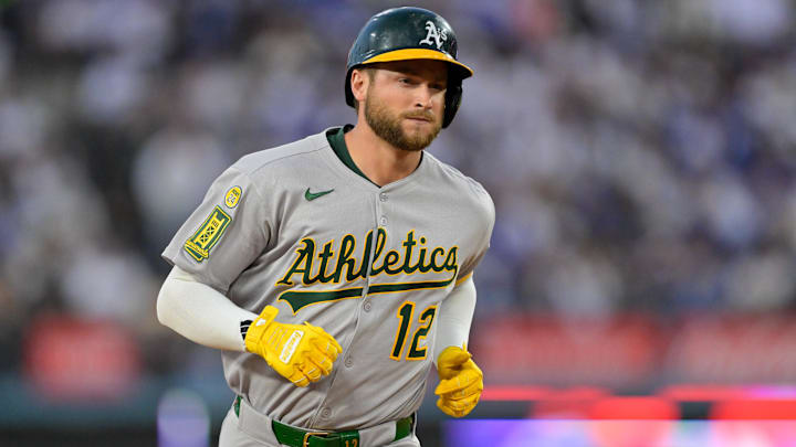 May 15, 2025; Los Angeles, California, USA; Athletics second baseman Max Schuemann (12) rounds the bases after hitting a solo home run against the Los Angeles Dodgers during the second inning of the game at Dodger Stadium. Mandatory Credit: Jayne Kamin-Oncea-Imagn Images