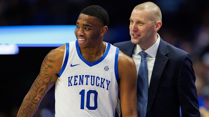 Dec 31, 2024; Lexington, Kentucky, USA; Kentucky Wildcats head coach Mark Pope talks with forward Brandon Garrison (10) during the second half against the Brown Bears at Rupp Arena at Central Bank Center. Mandatory Credit: Jordan Prather-Imagn Images