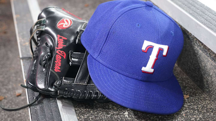 Jul 26, 2024; Toronto, Ontario, CAN; The hat and glove of Texas Rangers fielder Leody Taveras (3) during a game against the Toronto Blue Jays at Rogers Centre. Mandatory Credit: John E. Sokolowski-Imagn Images Jul 26, 2024; Toronto, Ontario, CAN; The hat and glove of Texas Rangers fielder Leody Taveras (3) during a game against the Toronto Blue Jays at Rogers Centre. Mandatory Credit: John E. Sokolowski-Imagn Images