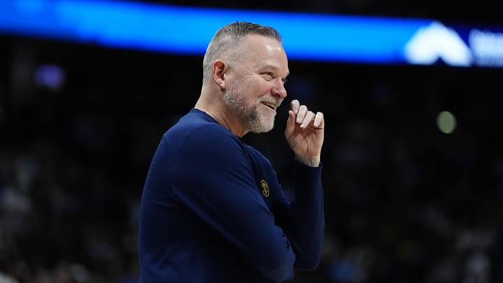 Mar 28, 2025; Denver, Colorado, USA; Denver Nuggets head coach Michael Malone  reacts in the second half against the Utah Jazz at Ball Arena. Mandatory Credit: Ron Chenoy-Imagn Images