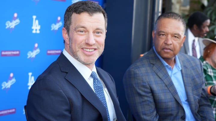 Dec 14, 2023; Los Angeles, CA, USA; Los Angeles Dodgers president of baseball operations Andrew Friedman (left) and manager Dave Roberts at press conference at Dodger Stadium. Mandatory Credit: Kirby Lee-Imagn Images