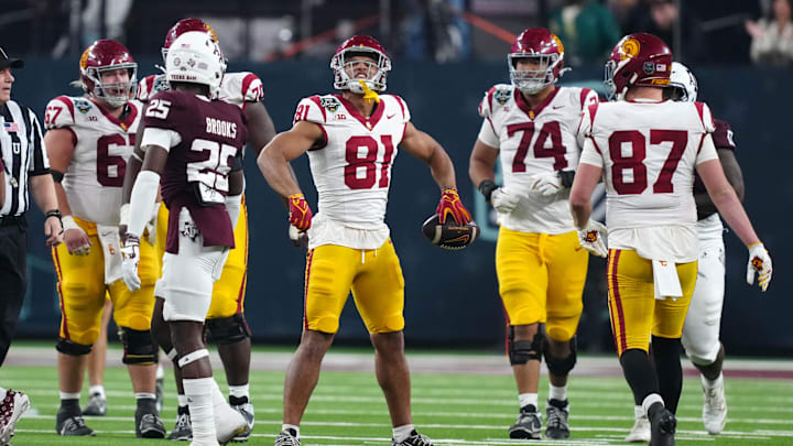 Dec 27, 2024; Las Vegas, NV, USA; Southern California Trojans wide receiver Kyle Ford (81) celebrates after a first down against the Texas A&M Aggies in the second half at Allegiant Stadium. Mandatory Credit: Kirby Lee-Imagn Images