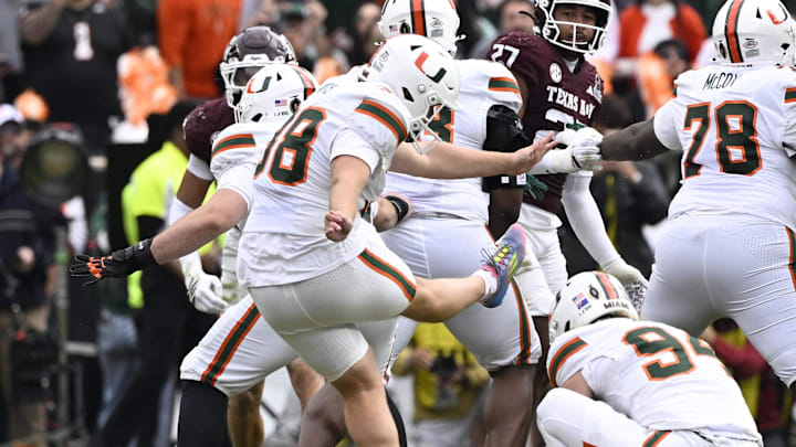 Dec 20, 2025; College Station, TX, USA; Miami Hurricanes kicker Carter Davis (38) misses his second field goal against the Texas A&M Aggies during first half of the first round game of the CFP National Playoff at Kyle Field. Mandatory Credit: Jerome Miron-Imagn Images