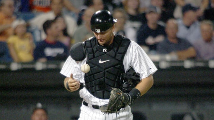 Chicago White Sox catcher #12 AJ Pierzynski reacts after two runs scored on Lew Ford's single in the 4th inning against at US Cellular Field in 2005. Chicago White Sox catcher #12 AJ Pierzynski reacts after two runs scored on Lew Ford's single in the 4th inning against at US Cellular Field in 2005.