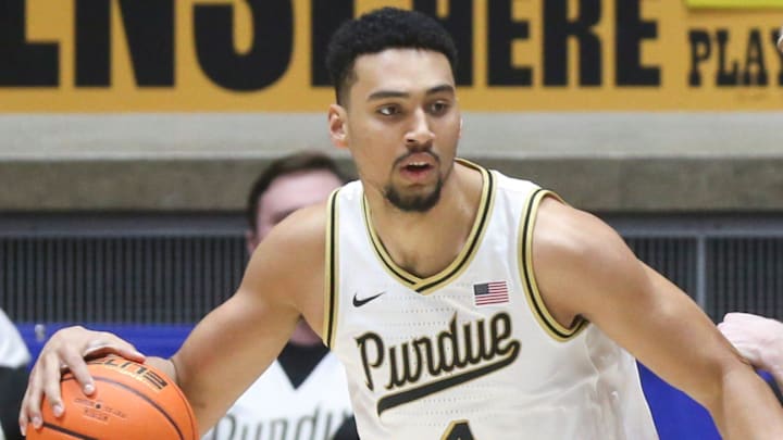 Purdue Boilermakers forward Trey Kaufman-Renn (4) backs down a defender.
