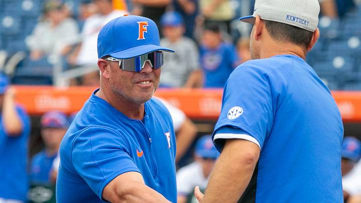Florida head coach Kevin O'Sullivan (7) and Kentucky head coach Nick Mingione (27) shake heads before the start of Game 1, Friday, May 10, 2024, at Condron Family Ballpark in Gainesville, Florida. The Gators lost 12-11 in extra innings. [Cyndi Chambers/ Gainesville Sun] 2024