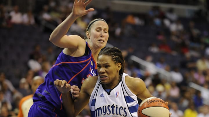 June 27, 2010; Washington, DC, USA; Washington Mystics forward Monique Currie (right) drives to the basket past Phoenix Mercury forward Nicole Ohlde during the second half at the Verizon Center. Mandatory Credit: Rafael Suanes-Imagn Images June 27, 2010; Washington, DC, USA; Washington Mystics forward Monique Currie (right) drives to the basket past Phoenix Mercury forward Nicole Ohlde during the second half at the Verizon Center. Mandatory Credit: Rafael Suanes-Imagn Images