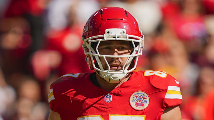 Kansas City Chiefs tight end Travis Kelce (87) gets into position prior to the snap during the first half against the Las Vegas Raiders at GEHA Field at Arrowhead Stadium. Kansas City Chiefs tight end Travis Kelce (87) gets into position prior to the snap during the first half against the Las Vegas Raiders at GEHA Field at Arrowhead Stadium.