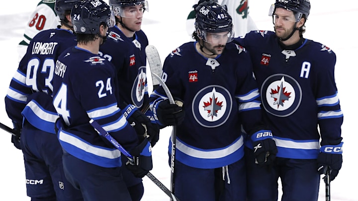 Sep 21, 2024; Winnipeg, Manitoba, CAN; Winnipeg Jets Forward Colby Barlow celebrates his third period goal against the Minnesota Wild at Canada Life Centre. Mandatory Credit: James Carey Lauder-Imagn Images