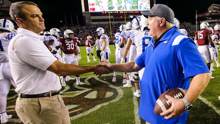 South Carolina football coach Shane Beamer with Kentucky Wildcats headman Mark Stoops