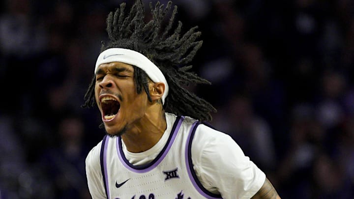Dec 30, 2024; Manhattan, Kansas, USA; Kansas State Wildcats guard Dug McDaniel (0) celebrates after scoring during the first half against the Cincinnati Bearcats at Bramlage Coliseum. Mandatory Credit: Jay Biggerstaff-Imagn Images