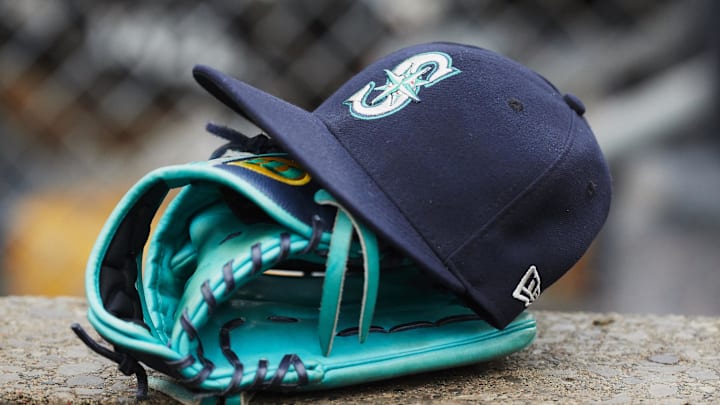May 12, 2018; Detroit, MI, USA; Hat and glove of Seattle Mariners center fielder Dee Gordon (9) sits in dugout during the third inning against the Detroit Tigers at Comerica Park. Mandatory Credit: Rick Osentoski-Imagn Images