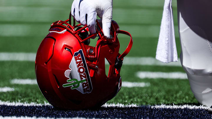 Oct 4, 2025; Tucson, Arizona, USA; The helmet of an Arizona Wildcats player is seen in the end zone before the ga,e against the Oklahoma State Cowboys at Arizona Stadium. Mandatory Credit: Aryanna Frank-Imagn Images