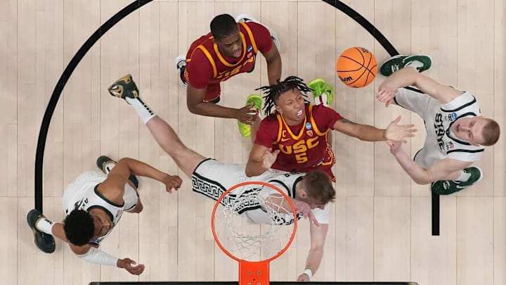 Mar 17, 2023; Columbus, Ohio, USA;  USC Trojans guard Boogie Ellis (5) fights for a rebound with Michigan State Spartans center Carson Cooper (15) and forward Joey Hauser (10) during the first round of the NCAA men   s basketball tournament at Nationwide Arena. Marquette won 78-61. Mandatory Credit: Adam Cairns-The Columbus Dispatch

Basketball Ncaa Men S Basketball Tournament