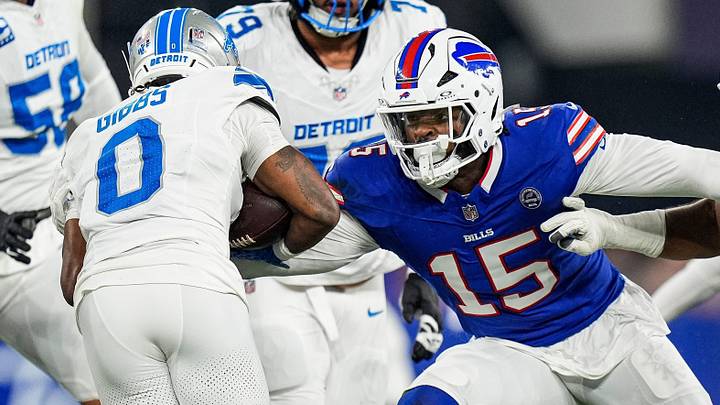 Buffalo Bills' outside linebacker Gregory Rousseau (15) tackles Detroit Lions' running back Jahmyr Gibbs (0) during the first half at Highmark Stadium in Orchard Park, New York, on Thursday, Sept. 17, 2026. Buffalo Bills' outside linebacker Gregory Rousseau (15) tackles Detroit Lions' running back Jahmyr Gibbs (0) during the first half at Highmark Stadium in Orchard Park, New York, on Thursday, Sept. 17, 2026.