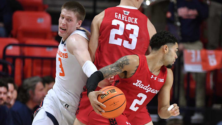 Feb 10, 2026; Champaign, Illinois, USA;  Wisconsin Badgers forward Will Garlock (23) screens Illinois Fighting Illini forward Ben Humrichhous (3) as guard Nick Boyd (2) drives the ball during the first half at State Farm Center. Mandatory Credit: Ron Johnson-Imagn Images