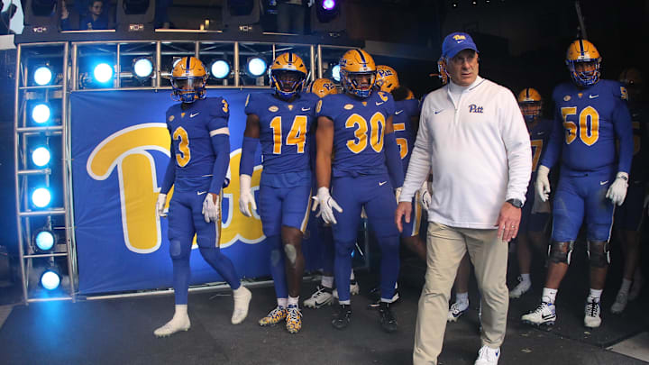 Nov 16, 2024; Pittsburgh, Pennsylvania, USA; Pittsburgh Panthers head coach Pat Narduzzi leads the Panthers out of the tunnel to play the Clemson Tigers at Acrisure Stadium. Mandatory Credit: Charles LeClaire-Imagn Images