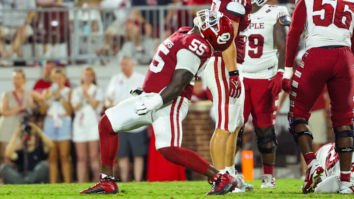 Aug 30, 2024; Norman, Oklahoma, USA; Oklahoma Sooners defensive lineman Ashton Sanders (55) reacts during the second half against the Temple Owls at Gaylord Family-Oklahoma Memorial Stadium. Mandatory Credit: Kevin Jairaj-Imagn Images Aug 30, 2024; Norman, Oklahoma, USA; Oklahoma Sooners defensive lineman Ashton Sanders (55) reacts during the second half against the Temple Owls at Gaylord Family-Oklahoma Memorial Stadium. Mandatory Credit: Kevin Jairaj-Imagn Images