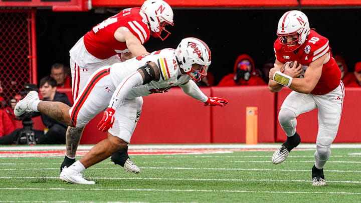 Nebraska Cornhuskers quarterback Heinrich Haarberg (10) runs against Maryland Terrapins linebacker Kellan Wyatt (45) during the second quarter at Memorial Stadium.