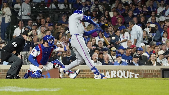Sep 25, 2025; Chicago, Illinois, USA; New York Mets third base Brett Baty (7) hits a three-run home run against the Chicago Cubs during the fourth inning at Wrigley Field. Mandatory Credit: David Banks-Imagn Images