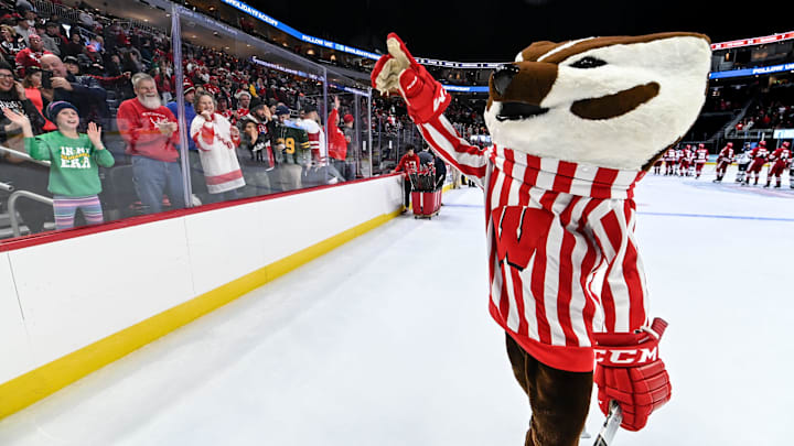 Bucky Badger fires up Wisconsin fans after a 4-3 victory over the Connecticut Huskies in the championship game of the Kwik Trip Holiday Face-Off on Sunday, December 29, 2024, at Fiserv Forum in Milwaukee, Wisconsin. Bucky Badger fires up Wisconsin fans after a 4-3 victory over the Connecticut Huskies in the championship game of the Kwik Trip Holiday Face-Off on Sunday, December 29, 2024, at Fiserv Forum in Milwaukee, Wisconsin.