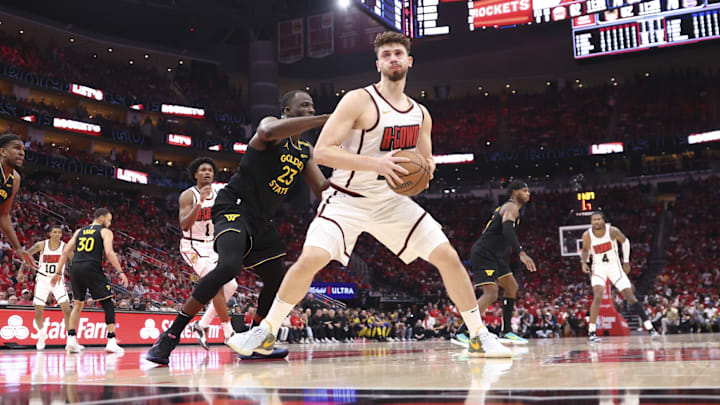 May 4, 2025; Houston, Texas, USA; Golden State Warriors forward Draymond Green (23) defends against Houston Rockets center Alperen Sengun (28) during game seven of the first round for the 2025 NBA Playoffs at Toyota Center. Mandatory Credit: Troy Taormina-Imagn Images