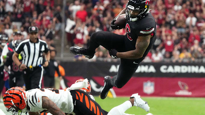 Oct 8, 2023; Glendale, Arizona, United States; Arizona Cardinals running back James Conner (6) dives for extra yards against the Cincinnati Bengals at State Farm Stadium.
