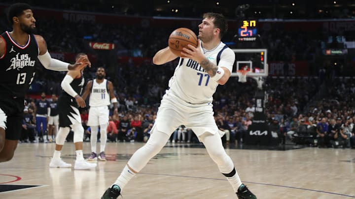 Apr 23, 2024; Los Angeles, California, USA; Dallas Mavericks guard Luka Doncic (77) looks to shoot
