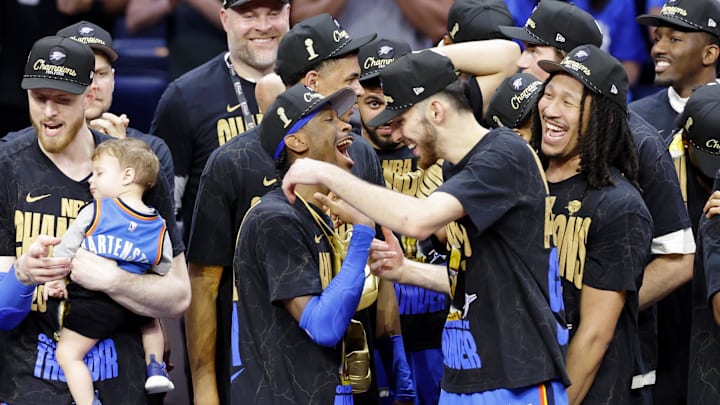 Oklahoma City Thunder guard Shai Gilgeous-Alexander (2) celebrates with Oklahoma City Thunder forward Chet Holmgren (7) after winning game seven of the 2025 NBA Finals against the Indiana Pacers at Paycom Center.