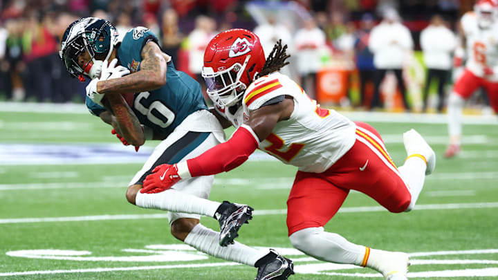 Feb 9, 2025; New Orleans, LA, USA; Philadelphia Eagles wide receiver DeVonta Smith (6) makes a catch against Kansas City Chiefs linebacker Nick Bolton (32) in the first quarter in Super Bowl LIX at Ceasars Superdome. Mandatory Credit: Mark J. Rebilas-Imagn Images