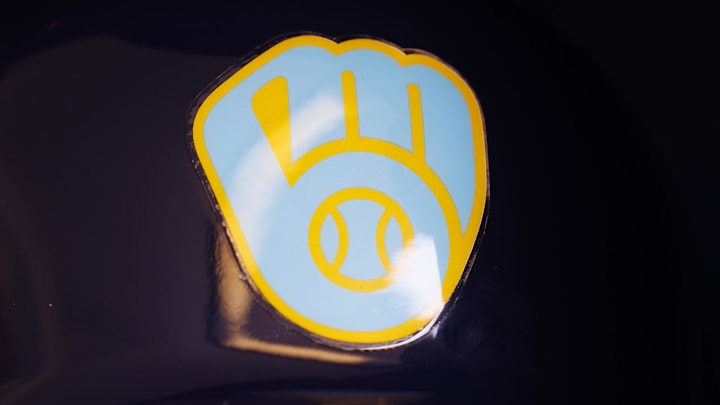 Jun 18, 2023; Milwaukee, Wisconsin, USA;  A Milwaukee Brewers logo on a batting helmet in the dugout