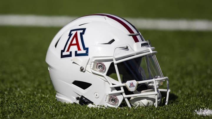 Nov 25, 2022; Tucson, Arizona, USA; Detailed view of an Arizona Wildcats helmet on the field during the Territorial Cup at Arizona Stadium. Mandatory Credit: Mark J. Rebilas-Imagn Images