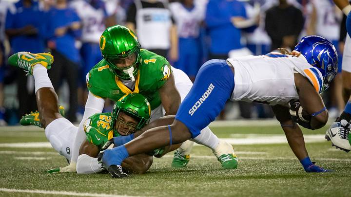 Boise State running back Ashton Jeanty is brought down by Oregon inside linebacker Devon Jackson and Oregon defensive end Jordan Burch as the Oregon Ducks host the Boise State Broncos Saturday, Sept. 7, 2024 at Autzen Stadium in Eugene, Ore. Boise State running back Ashton Jeanty is brought down by Oregon inside linebacker Devon Jackson and Oregon defensive end Jordan Burch as the Oregon Ducks host the Boise State Broncos Saturday, Sept. 7, 2024 at Autzen Stadium in Eugene, Ore.