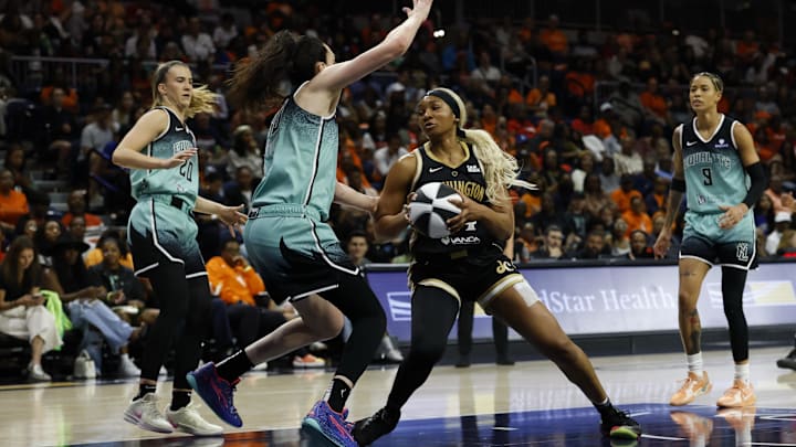 Jun 5, 2025; Washington, District of Columbia, USA; Washington Mystics forward Kiki Iriafen (44) drives to the basket as New York Liberty forward Breanna Stewart (30) defends in the second half at Entertainment & Sports Arena. Mandatory Credit: Geoff Burke-Imagn Images