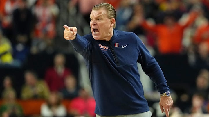Apr 4, 2026; Indianapolis, IN, USA; Illinois Fighting Illini head coach Brad Underwood reacts after a play against the UConn Huskies during the first half of a semifinal of the Final Four of the men's 2026 NCAA Tournament at Lucas Oil Stadium. Mandatory Credit: Bob Donnan-Imagn Images