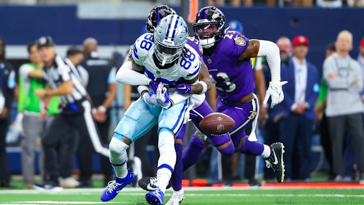 Sep 22, 2024; Arlington, Texas, USA;  Baltimore Ravens cornerback Nate Wiggins (2) knocks the ball out of the hands of Dallas Cowboys wide receiver CeeDee Lamb (88) during the first half at AT&T Stadium. Mandatory Credit: Kevin Jairaj-Imagn Images