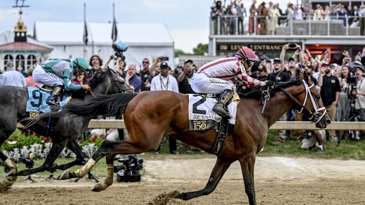 May 17, 2025; Baltimore, Maryland, USA;  Journalism (2) with Umberto Rispoli up defeats Gosger (9) with Irad Ortiz Jr. up to win the running of the 150th Preakness stakes. Mandatory Credit: Tommy Gilligan-Imagn Images