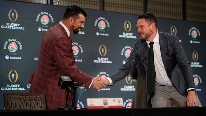 Ohio State Buckeyes head coach Ryan Day shakes hands with Oregon Ducks head coach Dan Lanning during a Rose Bowl press conference in Los Angeles on Dec. 31, 2024. Ohio State Buckeyes head coach Ryan Day shakes hands with Oregon Ducks head coach Dan Lanning during a Rose Bowl press conference in Los Angeles on Dec. 31, 2024.