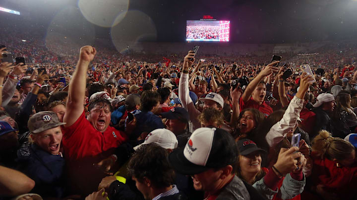 Nov 9, 2024; Oxford, Mississippi, USA; Mississippi Rebels fans react after tearing down the goal post after defeating the Georgia Bulldogs at Vaught-Hemingway Stadium. 