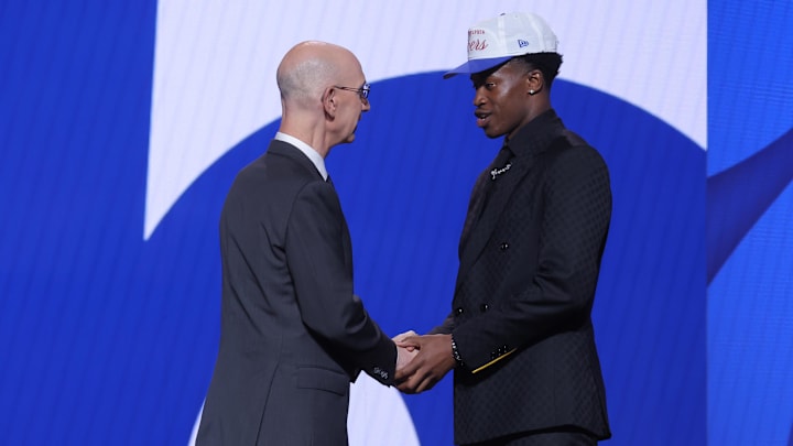 Jun 25, 2025; Brooklyn, NY, USA;  VJ Edgecombe stands with NBA commissioner Adam Silver after being selected as the third pick by the Philadelphia 76ers in the first round of the 2025 NBA Draft at Barclays Center. Mandatory Credit: Brad Penner-Imagn Images