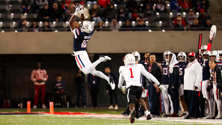 Nov 15, 2024; Tucson, Arizona, USA; Arizona Wildcats wide receiver Chris Hunter (16) catches the ball during the second quarter against the Houston Cougars at Arizona Stadium. Mandatory Credit: Aryanna Frank-Imagn Images