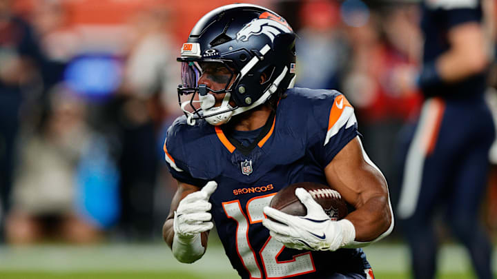 Sep 29, 2025; Denver, Colorado, USA; Denver Broncos running back RJ Harvey (12) rushes during the second quarter against the Cincinnati Bengals at Empower Field at Mile High. Mandatory Credit: Isaiah J. Downing-Imagn Images