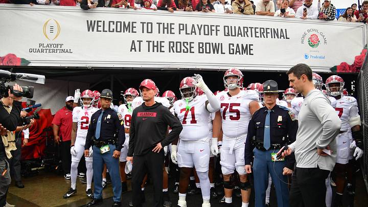 Jan 1, 2026; Pasadena, CA, USA; Alabama Crimson Tide players and head coach Kalen Deboer walk on field before the 2026 Rose Bowl and quarterfinal game of the College Football Playoff against the Indiana Hoosiers at Rose Bowl Stadium. Mandatory Credit: Gary A. Vasquez-Imagn Images Jan 1, 2026; Pasadena, CA, USA; Alabama Crimson Tide players and head coach Kalen Deboer walk on field before the 2026 Rose Bowl and quarterfinal game of the College Football Playoff against the Indiana Hoosiers at Rose Bowl Stadium. Mandatory Credit: Gary A. Vasquez-Imagn Images