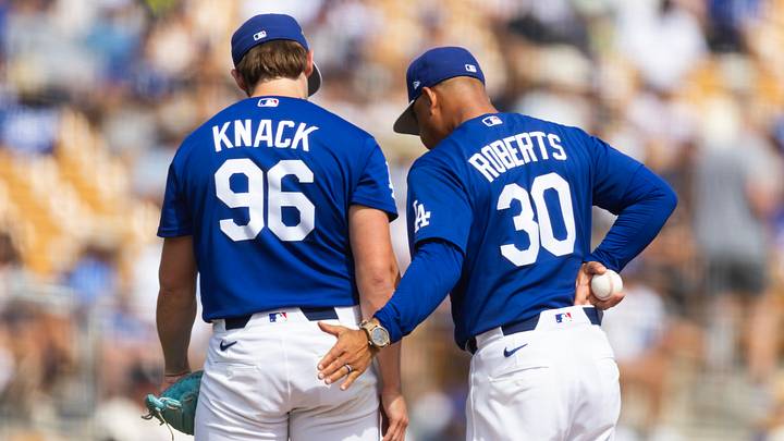 Mar 1, 2026; Phoenix, Arizona, USA; Los Angeles Dodgers pitcher Landon Knack (96) is pulled from the game by manager Dave Roberts against the Los Angeles Angels during a spring training game at Camelback Ranch-Glendale. Mandatory Credit: Mark J. Rebilas-Imagn Images