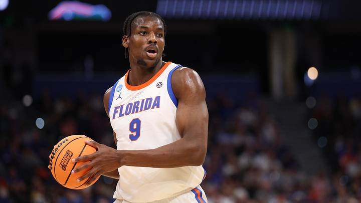 Mar 20, 2026; Tampa, FL, USA; Florida Gators center Rueben Chinyelu (9) looks to pass during the first half against the Prairie View A&M Panthers during a first round game of the men's 2026 NCAA Tournament at Benchmark International Arena. Mar 20, 2026; Tampa, FL, USA; Florida Gators center Rueben Chinyelu (9) looks to pass during the first half against the Prairie View A&M Panthers during a first round game of the men's 2026 NCAA Tournament at Benchmark International Arena.