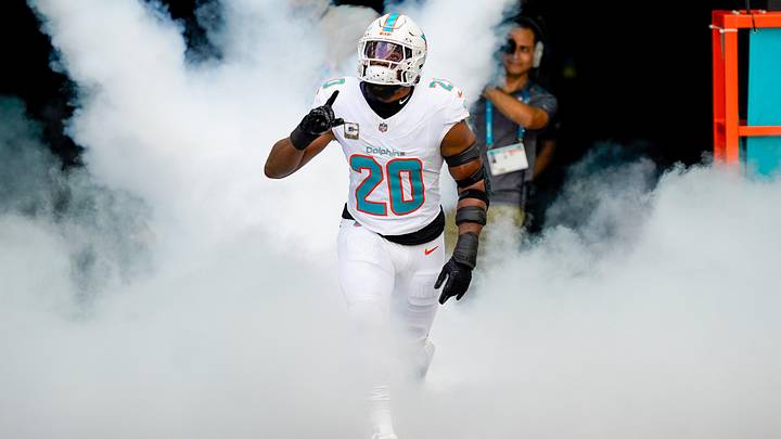 Miami Dolphins linebacker Jordyn Brooks (20) runs on the field before a game against the Buffalo Bills at Hard Rock Stadium in 2025.